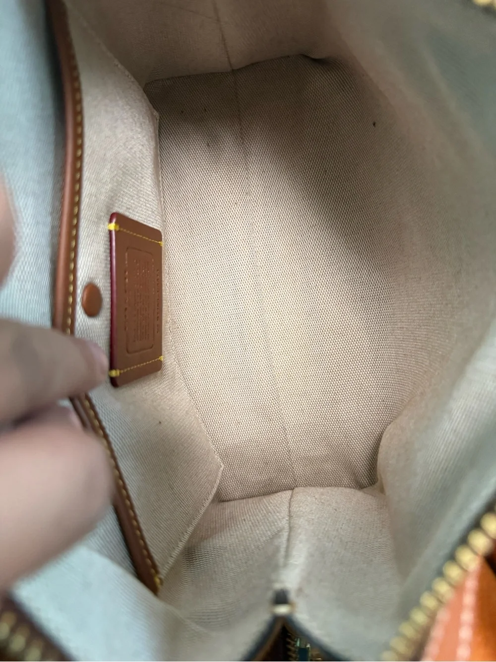 Coach Pebbled rouge 25 in papaya orange